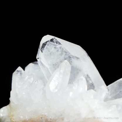 http://www.zearths.com/specimen/quartz-japan-law-twin-on-matrix-with-white-phantoms-from-itremo-madagascar/
