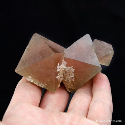 Stack of Three Pink Red Fluorite Crystals with Calcite from Huanggang Mine, Inner Mongolia, China